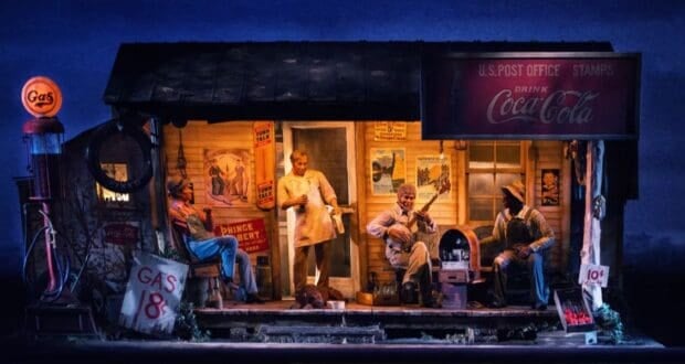 A vintage scene depicts a small gas station/store at night with an illuminated gas sign. People are sitting on the porch: one playing guitar, one on a stool, and another in a chef's uniform. An old Coca-Cola sign is visible, along with various other vintage advertisements. It's like stepping into Americana at Disney World.