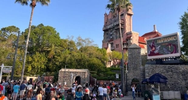 The Twilight Zone Tower of Terror and a Fantasmic! billboard at Disney World.