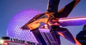 Guardians of the Galaxy: Cosmic Rewind ship in front of Spaceship Earth at EPCOT.
